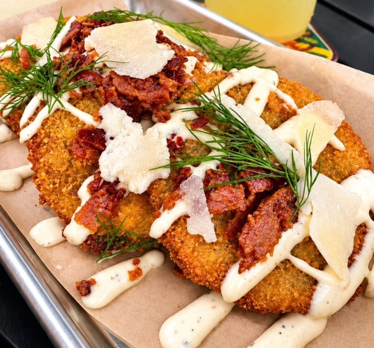 Fried green tomatoes with bacon, dill, shaved pecorino and ranch