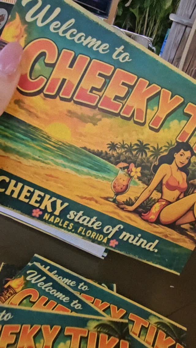 Vintage-style “Welcome to Cheeky Tiki” postcards featuring Lola on the beach