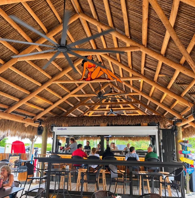 Under the big Seminole-built tiki hut, with Lola painted up in the rafters